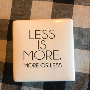 Pottery Barn “Less is More” sign